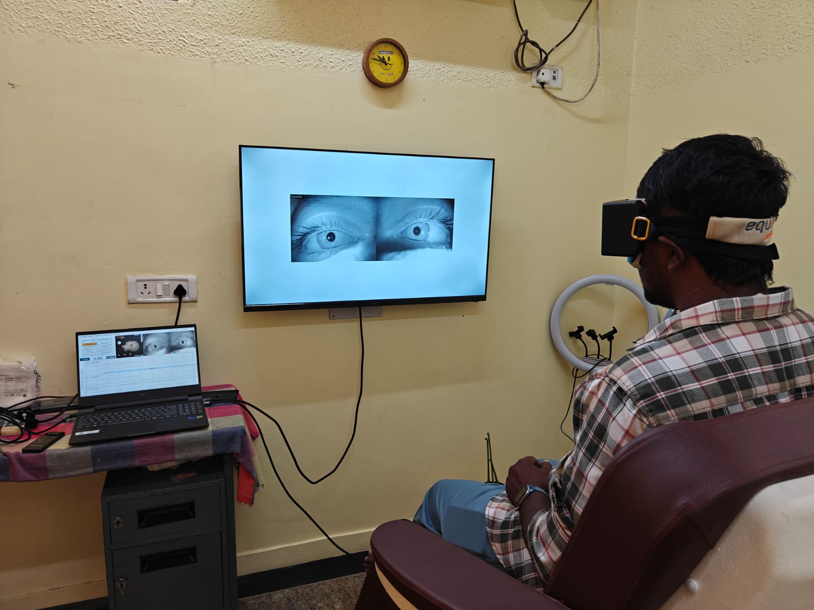 Patient undergoing Cranio-Oculography (COG) testing at CHESS Surgical Centre